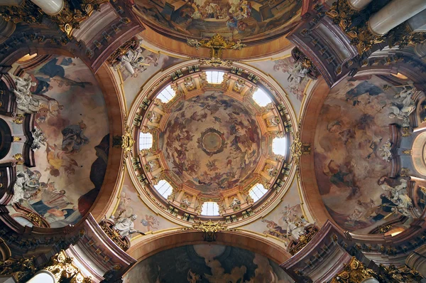 Cupola of st. Nicholas church, scene of The celebration of saint Nicholas. Prague Czech Republic.