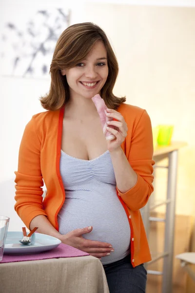 PREGNANT WOMAN EATING