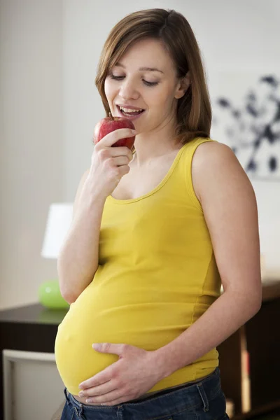 PREGNANT WOMAN EATING