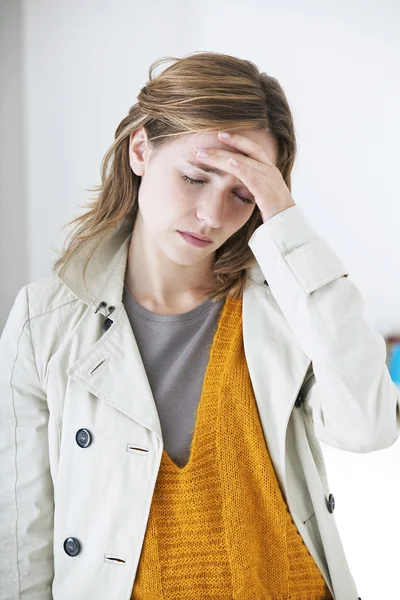 WOMAN WITH HEADACHE