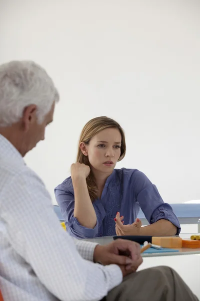 WOMAN IN CONSULTATION, DIALOGUE