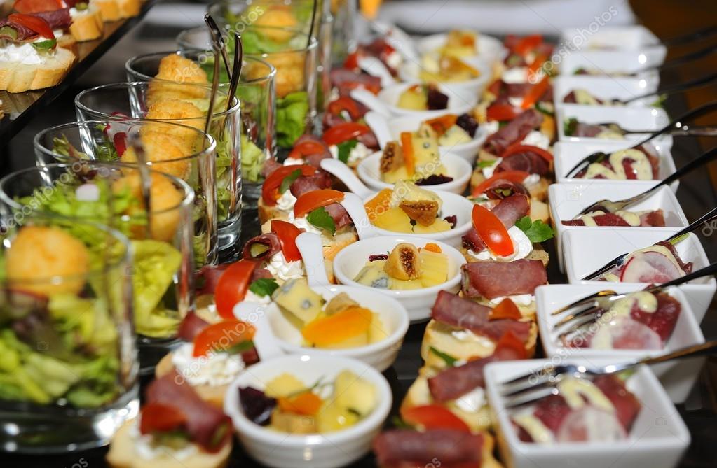 Finger food arrangement - food catering — Stock Photo © ToskanaInc