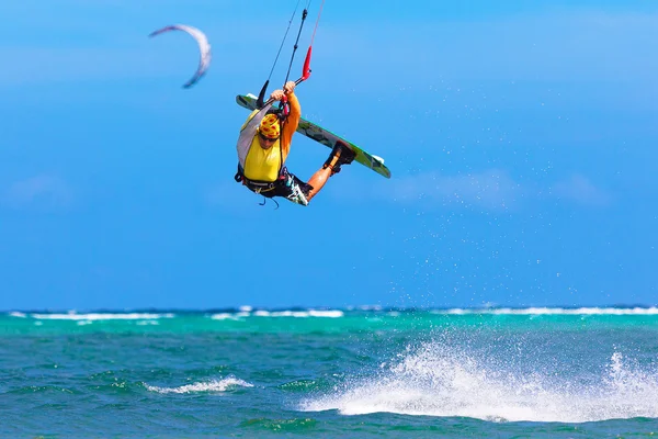 Young kitesurfer on sea background Extreme Sport Kitesurfing