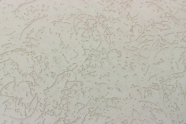 Neutral beige decorative plaster wall textured background