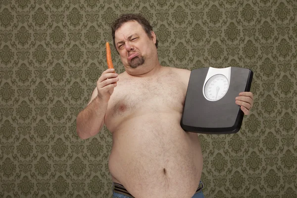 Overweight male making healthy choices