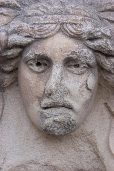 Sad face sculpture