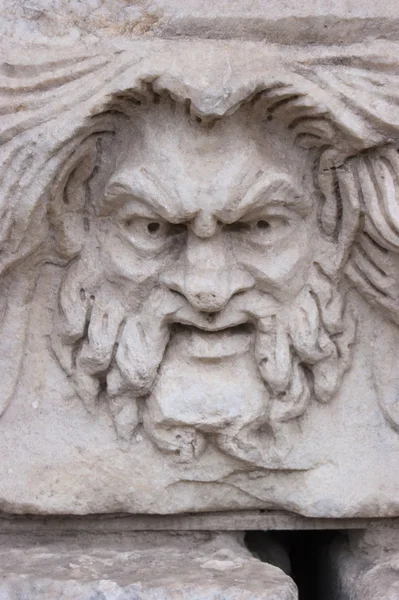 Mad face sculpture