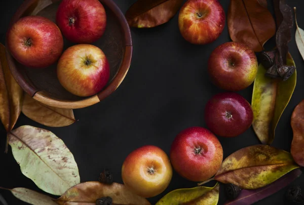 Autumn background with Red apples