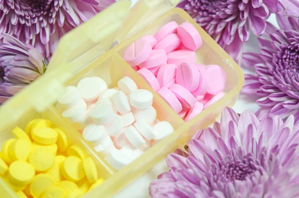 Pills in separated container.
