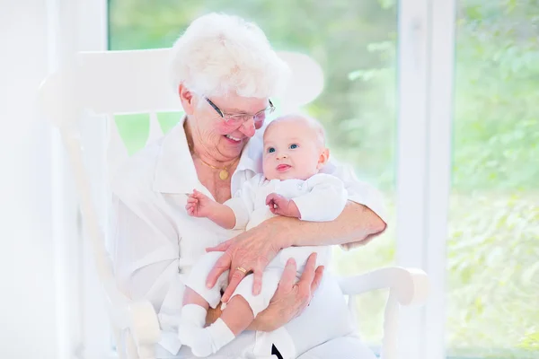 Grandmother singing a song to grandson