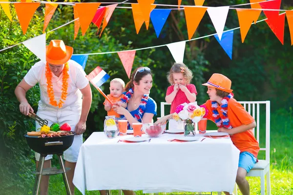 Dutch family having grill party