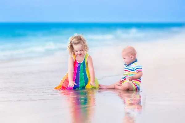 Two kids on a beach