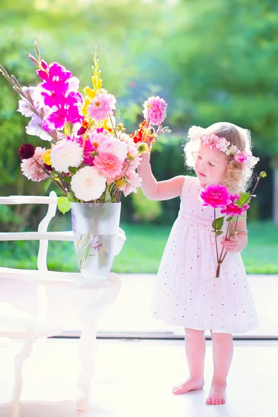 Little girl with flowers