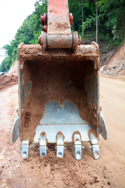 Heavy earth mover at construction site