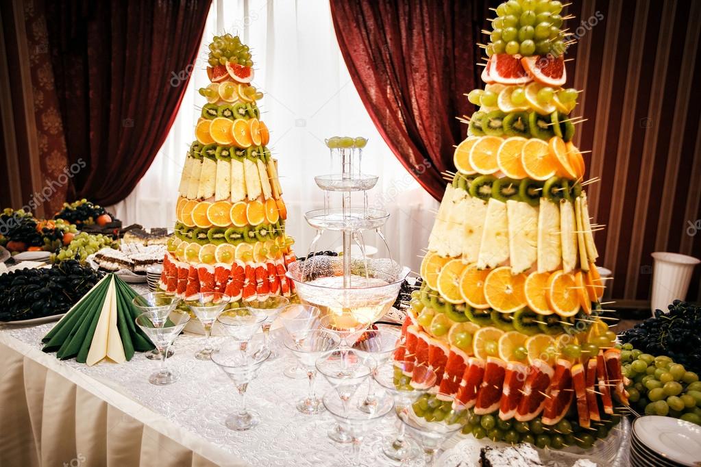 http://st.depositphotos.com/3247275/4435/i/950/depositphotos_44353317-Champagne-fountain-and-decorations-from.jpg