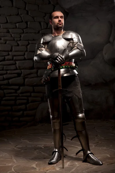 Medieval Knight posing with sword