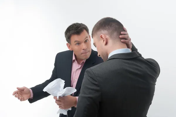 Boss angry with young employee