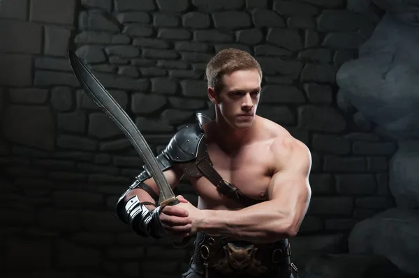 Gladiator with sword posing