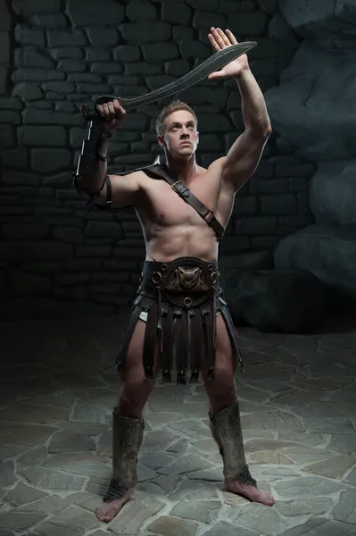 Gladiator with sword posing