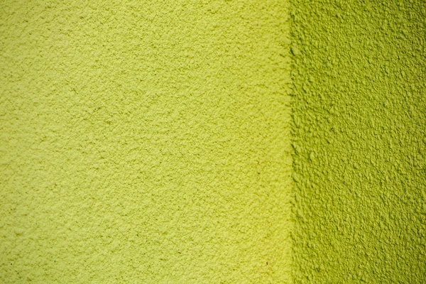 Green plaster wall with corner texture back