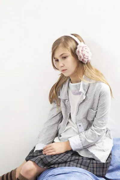 Pretty  beautiful girl with stress in earphone listen music