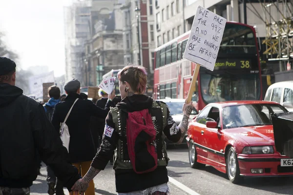 London protesters march against worldwide government corruption