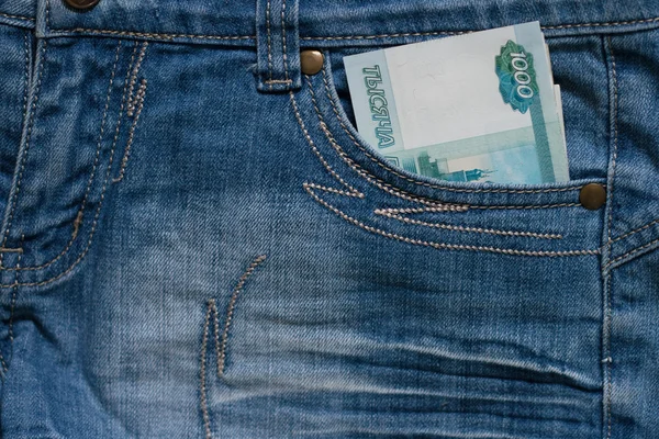 One Thousand Ruble Note in the pocket of jeans