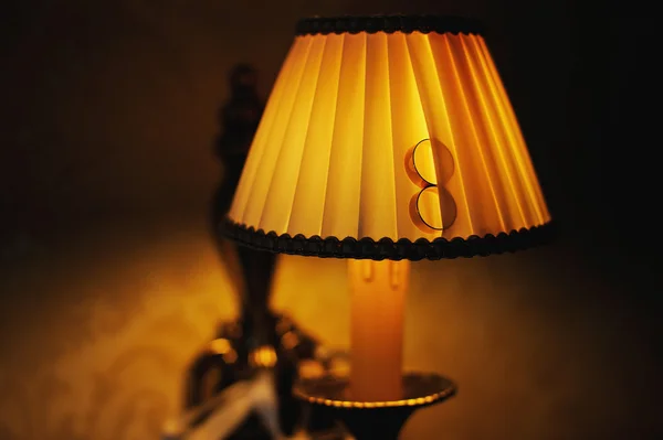 Wedding rings on the lamp