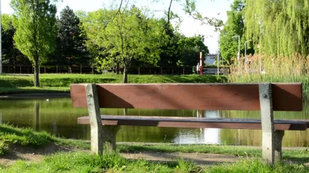 depositphotos_46427631-Lake-with-bench-and-nature.jpg