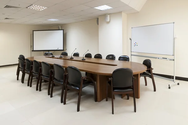 Conference table with board and screen