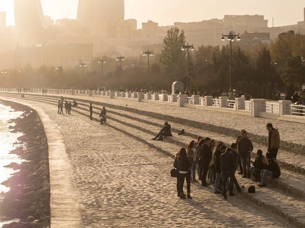 BAKU, AZERBAIJAN - NOVEMBER 22, 2013: Baku Boulevard at sunset. The boulevard was established in 1909 and today is a popular tourist attraction