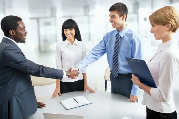 Business people shaking hands