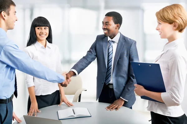 Business people shaking hands