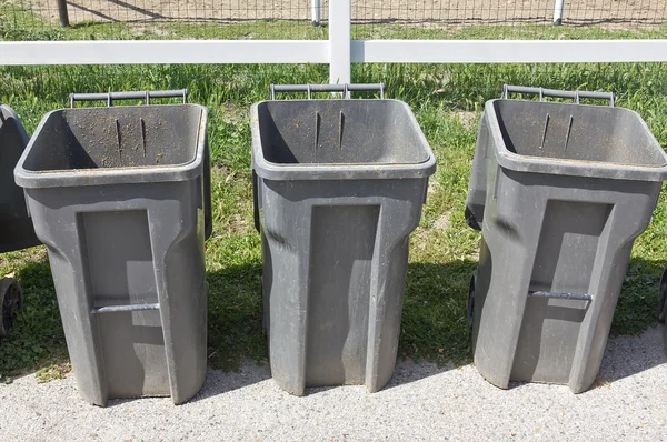 Three Trash Cans