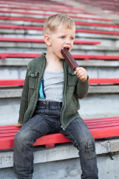 Boy eating ice cream outdoor