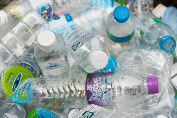 Pathumthani, Thailand - 2014: Clear plastic bottles lie in a bin