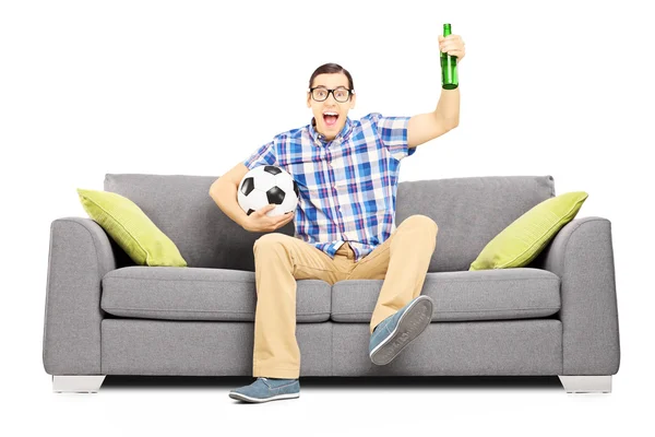 Sport fan with ball and beer