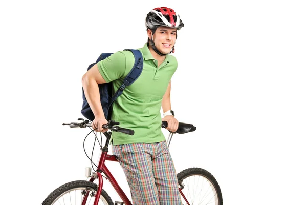 Man with backpack and bike