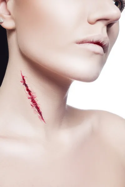 Girl with a cut on neck