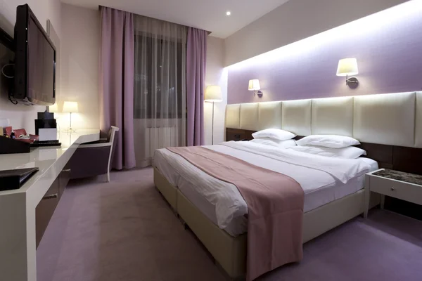 Beautiful pink and purple hotel room