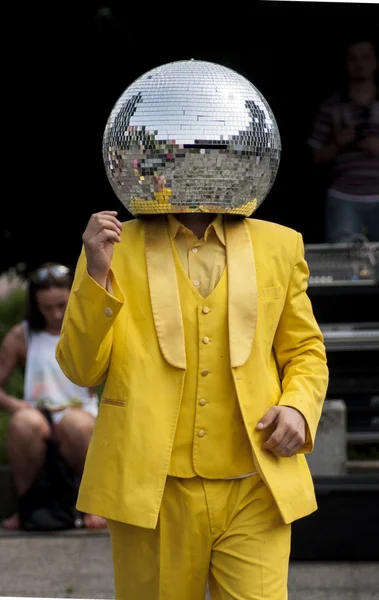 Disco Ball Man dancing in the street