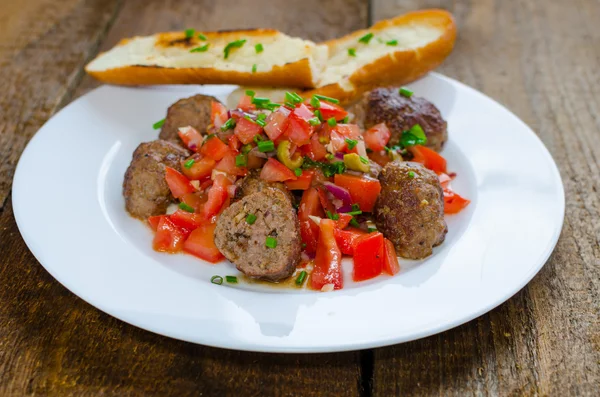 Meatballs with spicy tomato salsa