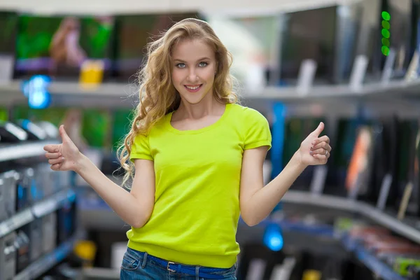 Woman showing thumbs up