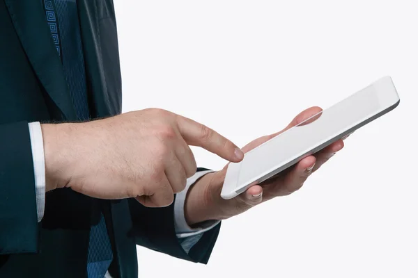 Closeup Of Businessman\'s Hand Using Digital Tablet Isolated On White Background