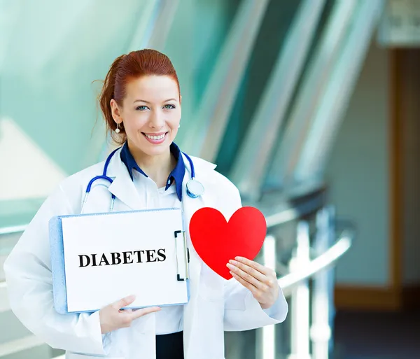 Female doctorholding diabetes sign