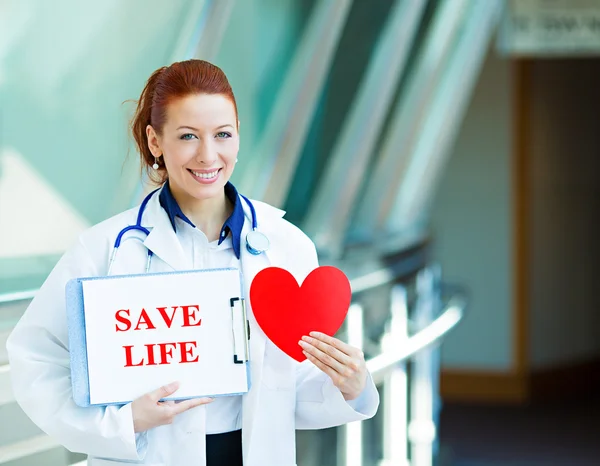 Doctor holding save life sign