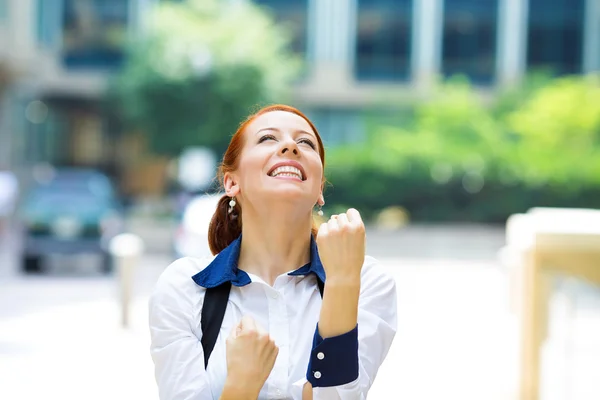 Businesswoman celebrating success