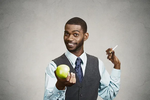 Happy man says no to smoking, makes healthy life choices