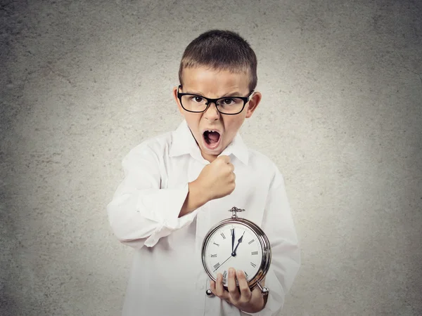 Angry screaming, child, boy holding alarm clock