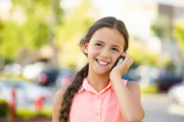 Happy girl talking on mobile, smart phone